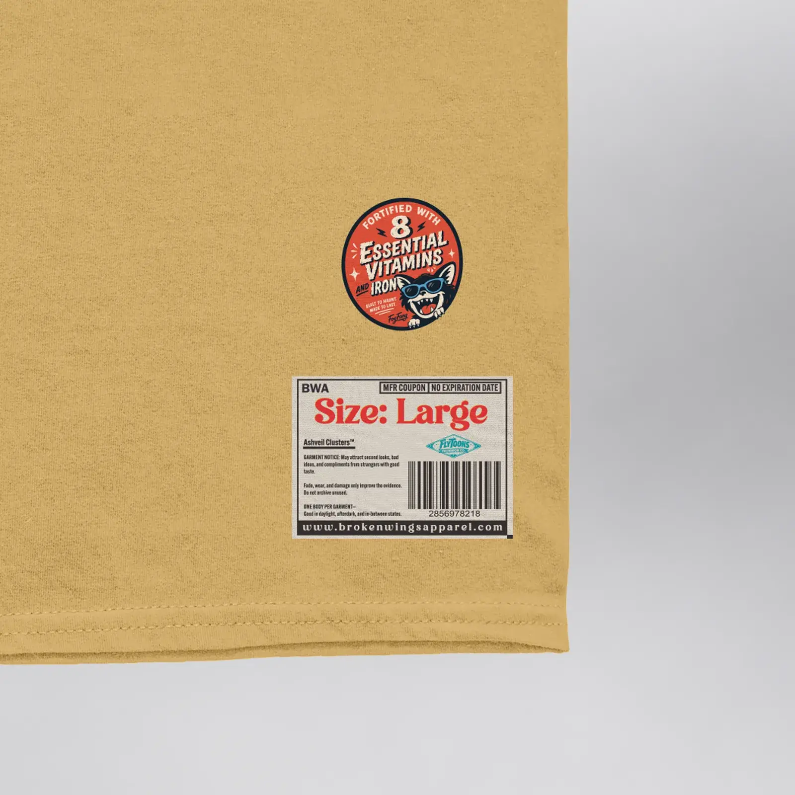 Ashveil Clusters Caramel Tee (Exclusive 1 of 1), close-up of the vitamin seal and the “Size: Large” coupon label on the front hem